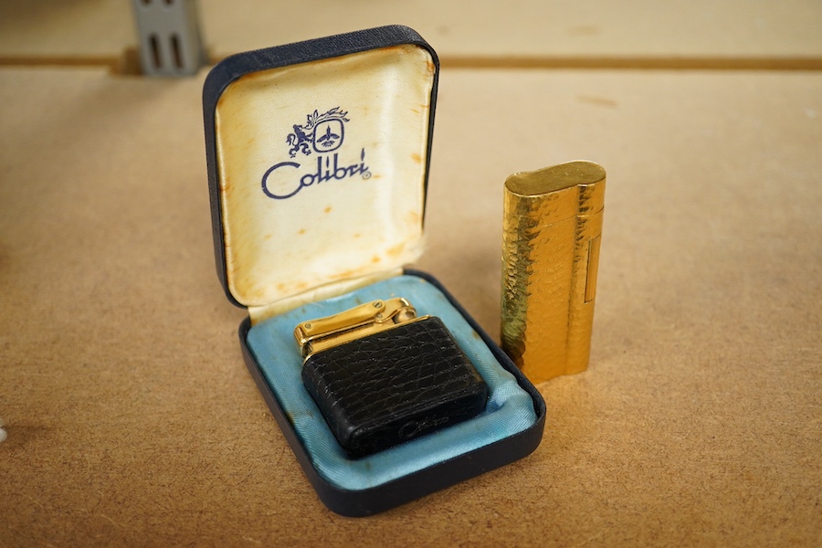 A Dunhill lighter and a Calibri lighter. Condition - not currently working